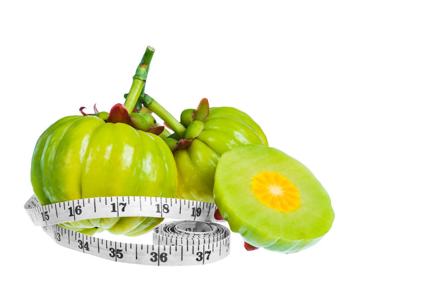 Frutti di garcinia cambogia con un metro da sarta