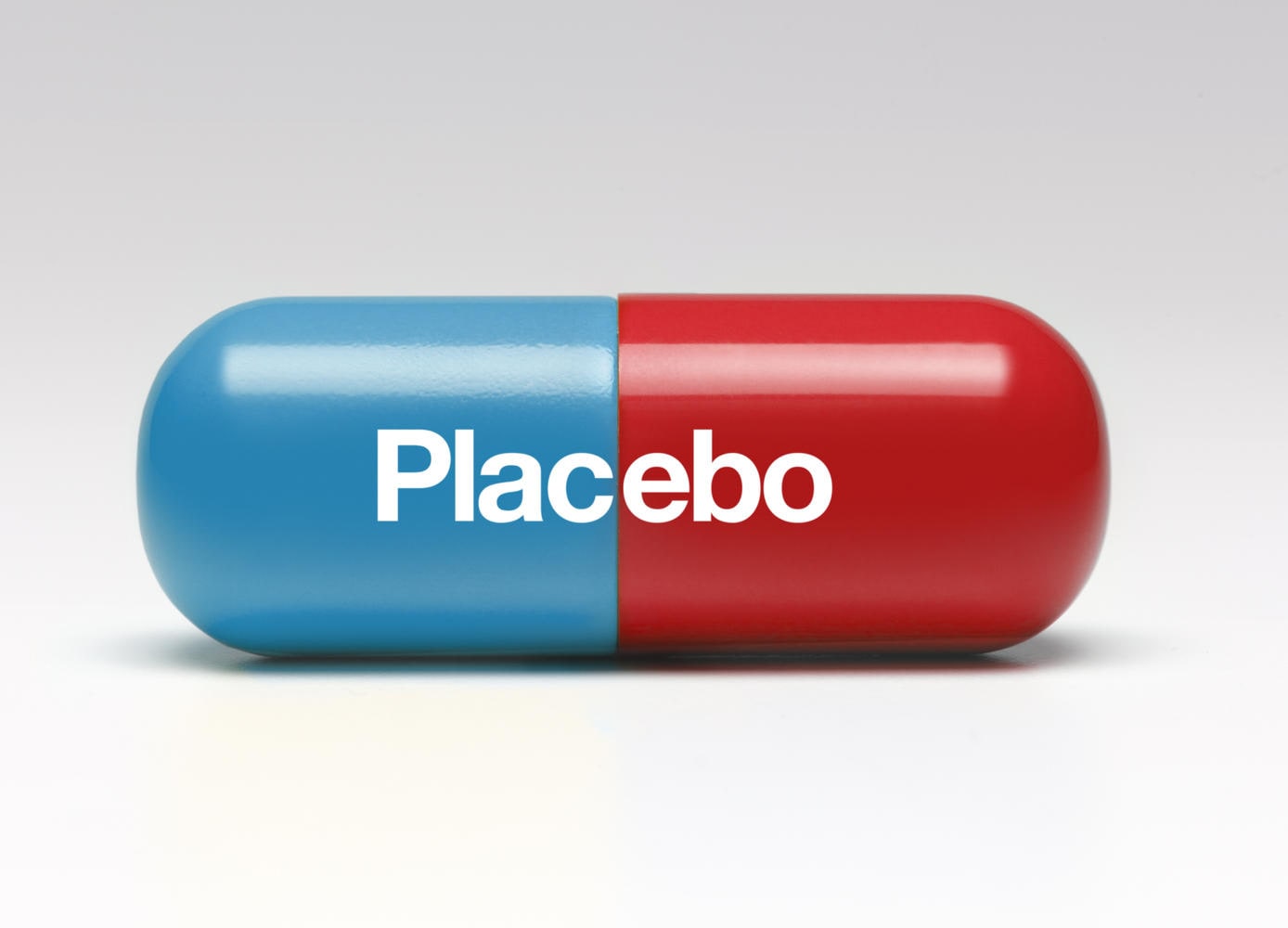 Capsula blu e rossa con la scritta in bianco "Placebo"