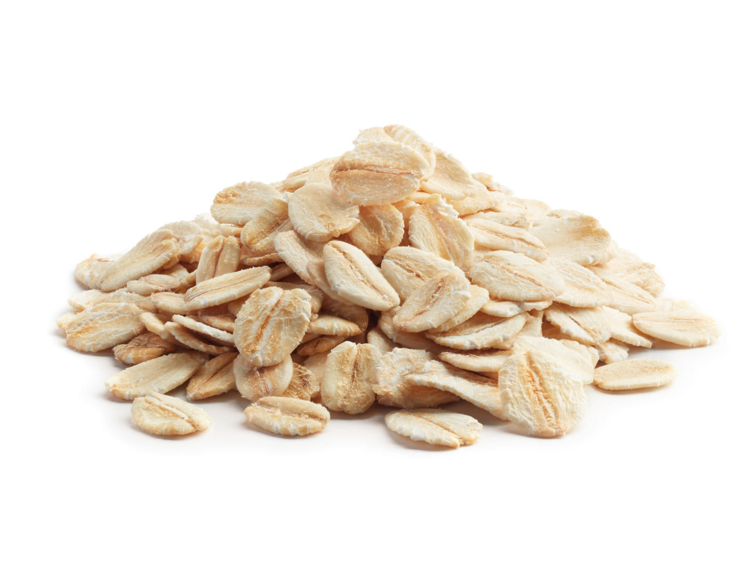 Fiocchi di avena su sfondo bianco