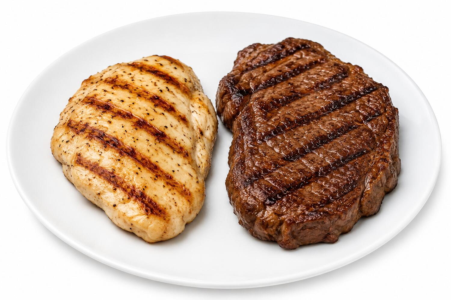 Piatto con una bistecca di carne bianca affiancata a una di carne rossa